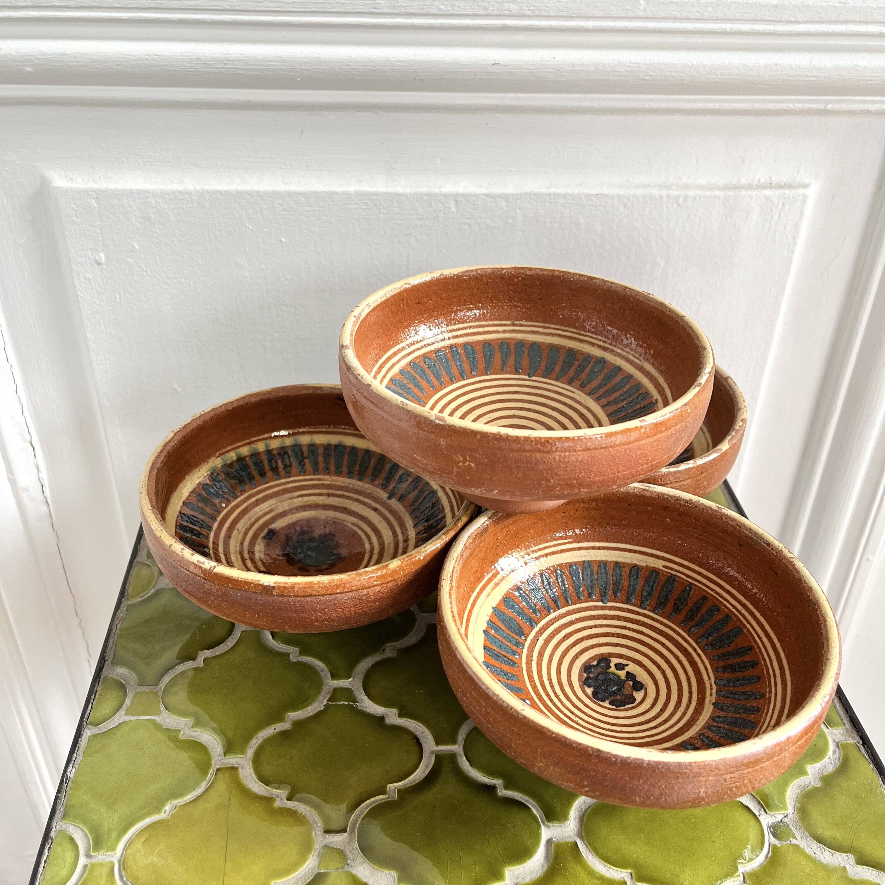 4 old handcrafted pottery bowls