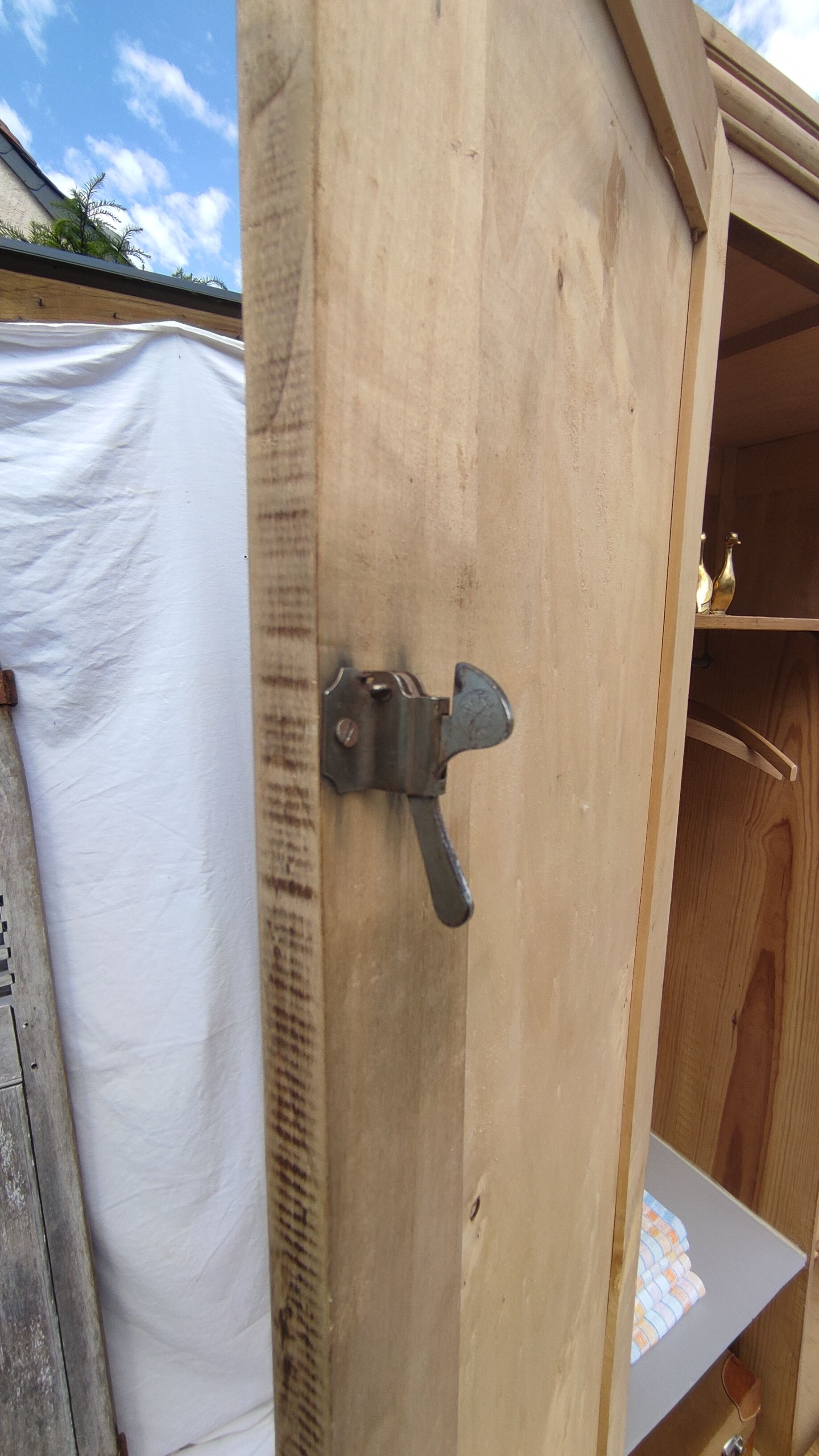 Parisian wardrobe in raw wood