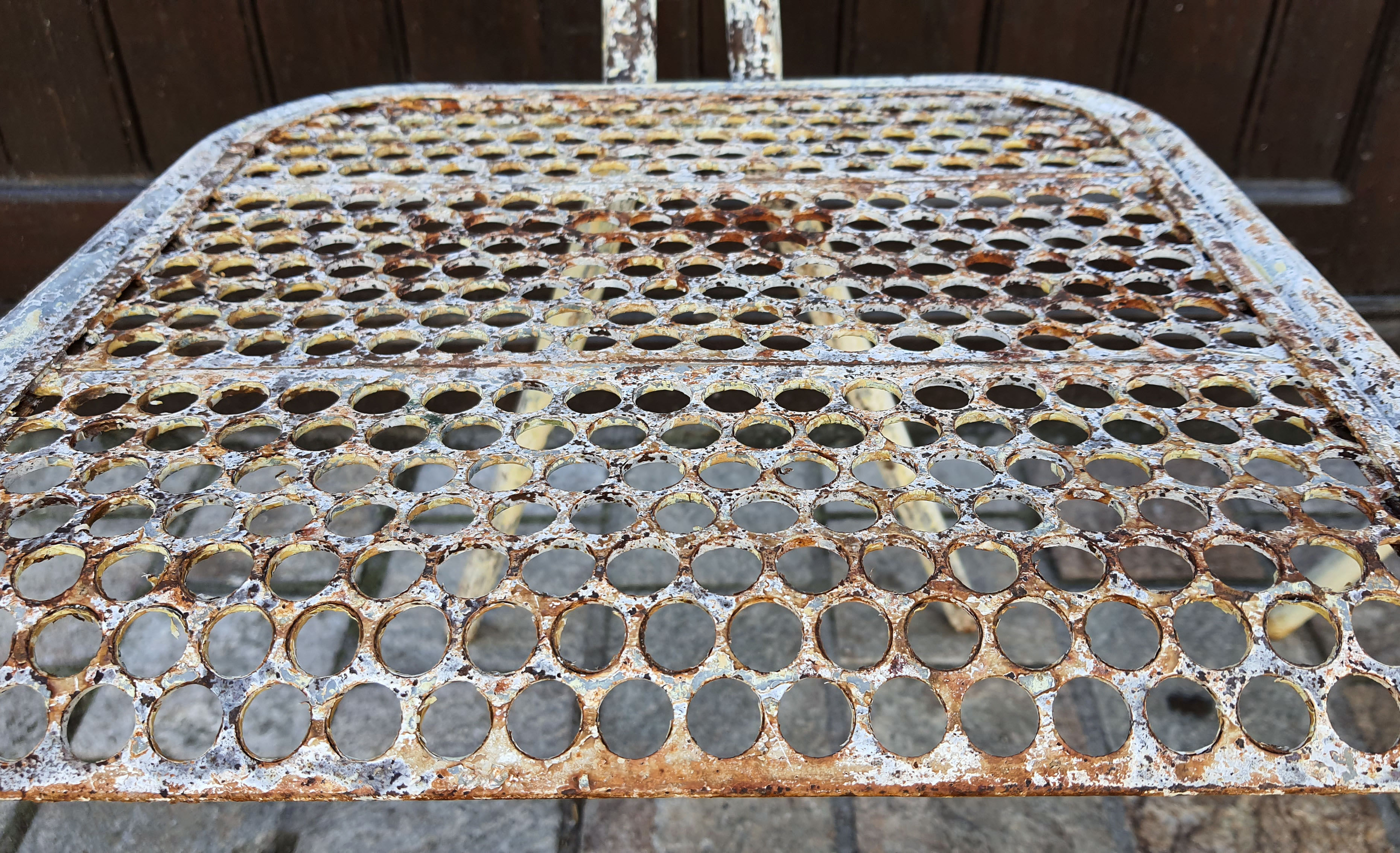 Perforated metal chairs René Malaval 1950