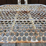 Perforated metal chairs René Malaval 1950