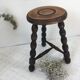 Turned wooden tripod farm stool