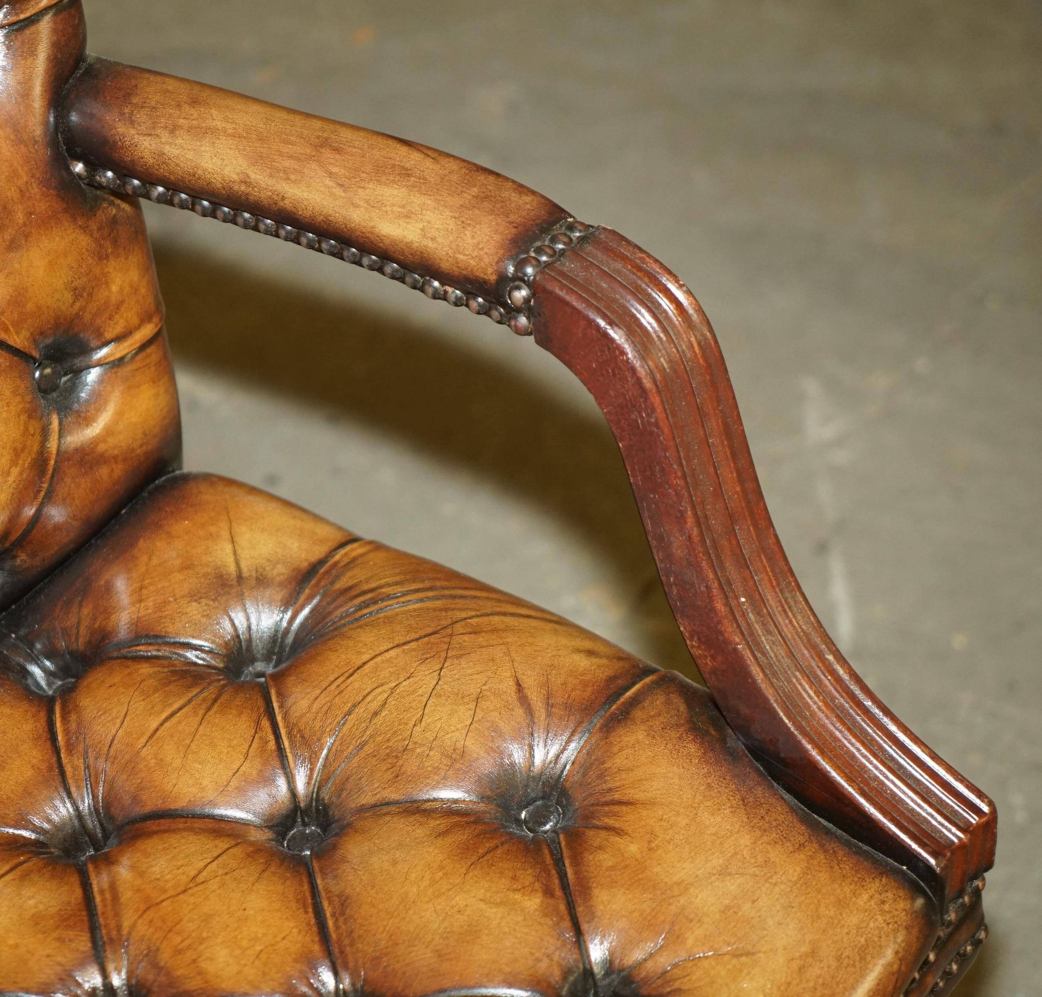 Restored leather captain's Chesterfield chair
