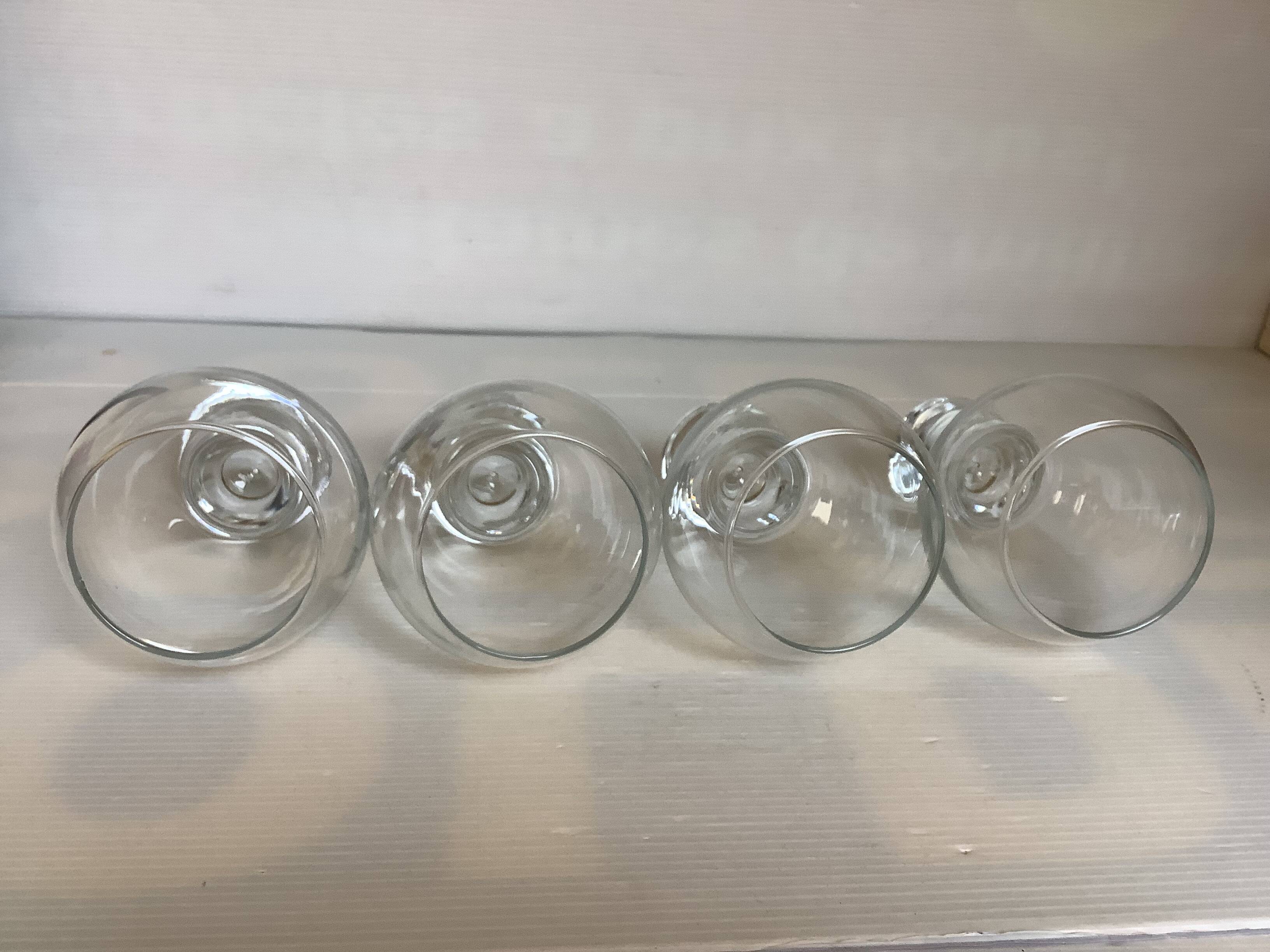 Four large bubble-style glasses by Kosta Boda.