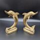 Pair of brass dolphins bookends