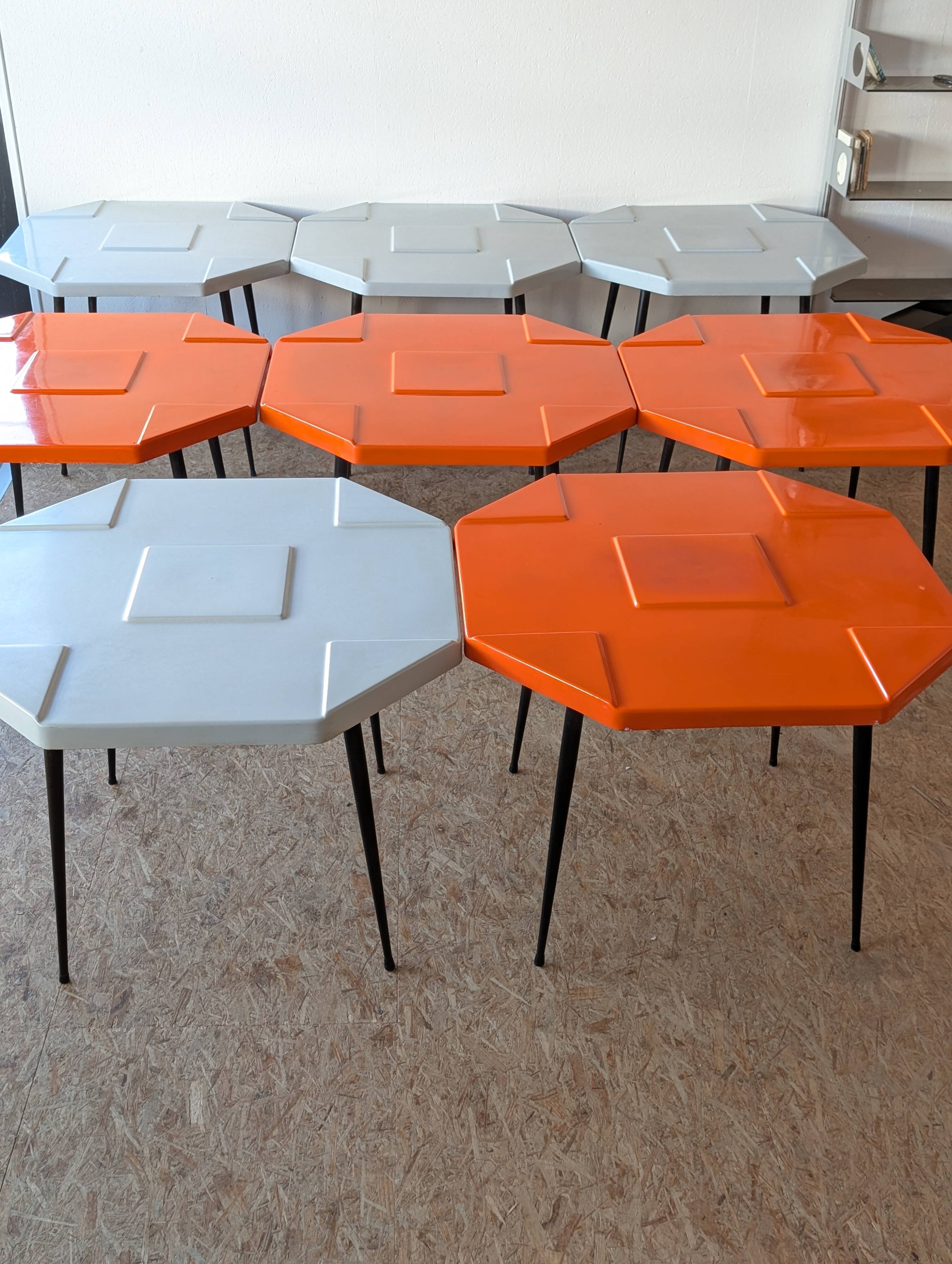 Set of 15 fibreglass tables from the 70s (11 orange and 4 grey) space age