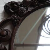 Miroir ancien en bois sculpté avec hauteur de 125 cm.