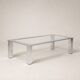 Table basse moderniste en acier chromé et verre clair — Europe, vers 1970