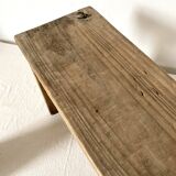 Low stool in raw wood