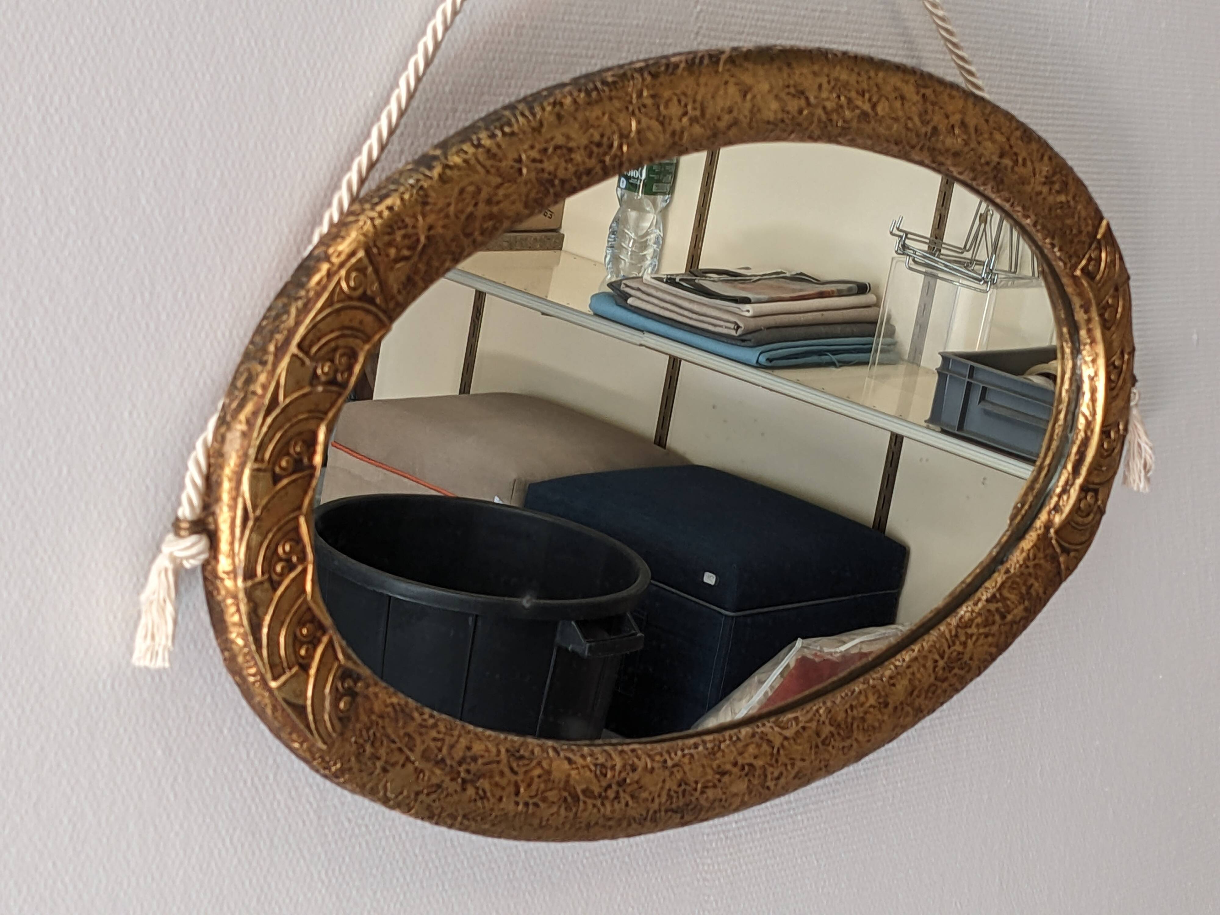Miroir ovale Art déco en bois doré vers 1920