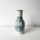 Cracked ceramic vase from the 1960s.