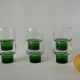 Set of 6 designer wine glasses with green feet from the 70s