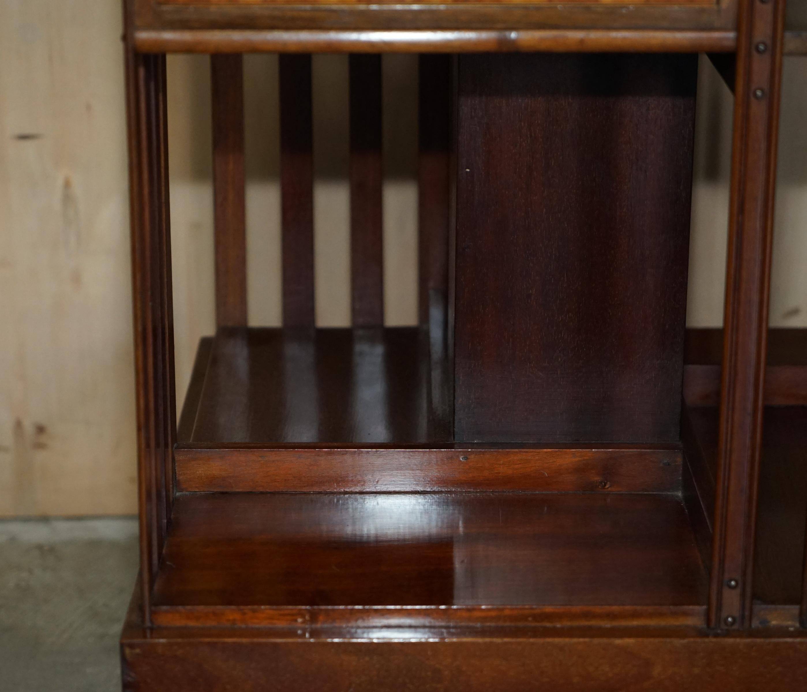 Restored Victorian walnut revolving library.