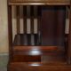 Restored Victorian walnut revolving library.