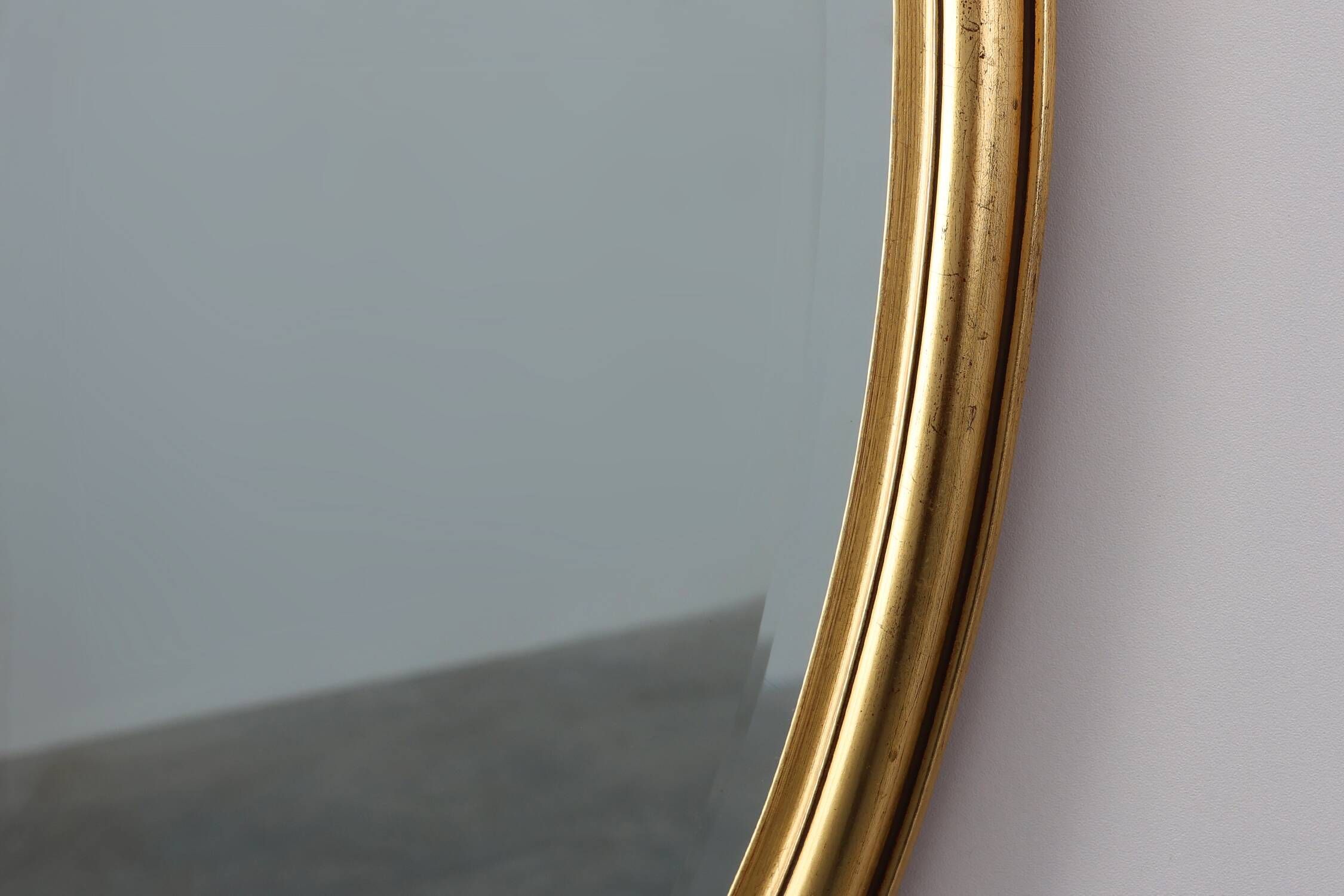 20th century Louis XVI style mirror in gilded wood, France