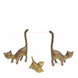 Couple brass cats and their baby cat