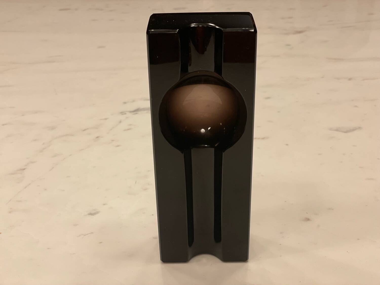 Individual cigar ashtray in black glass