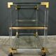 Rolling acrylic and brass serving table – 1960