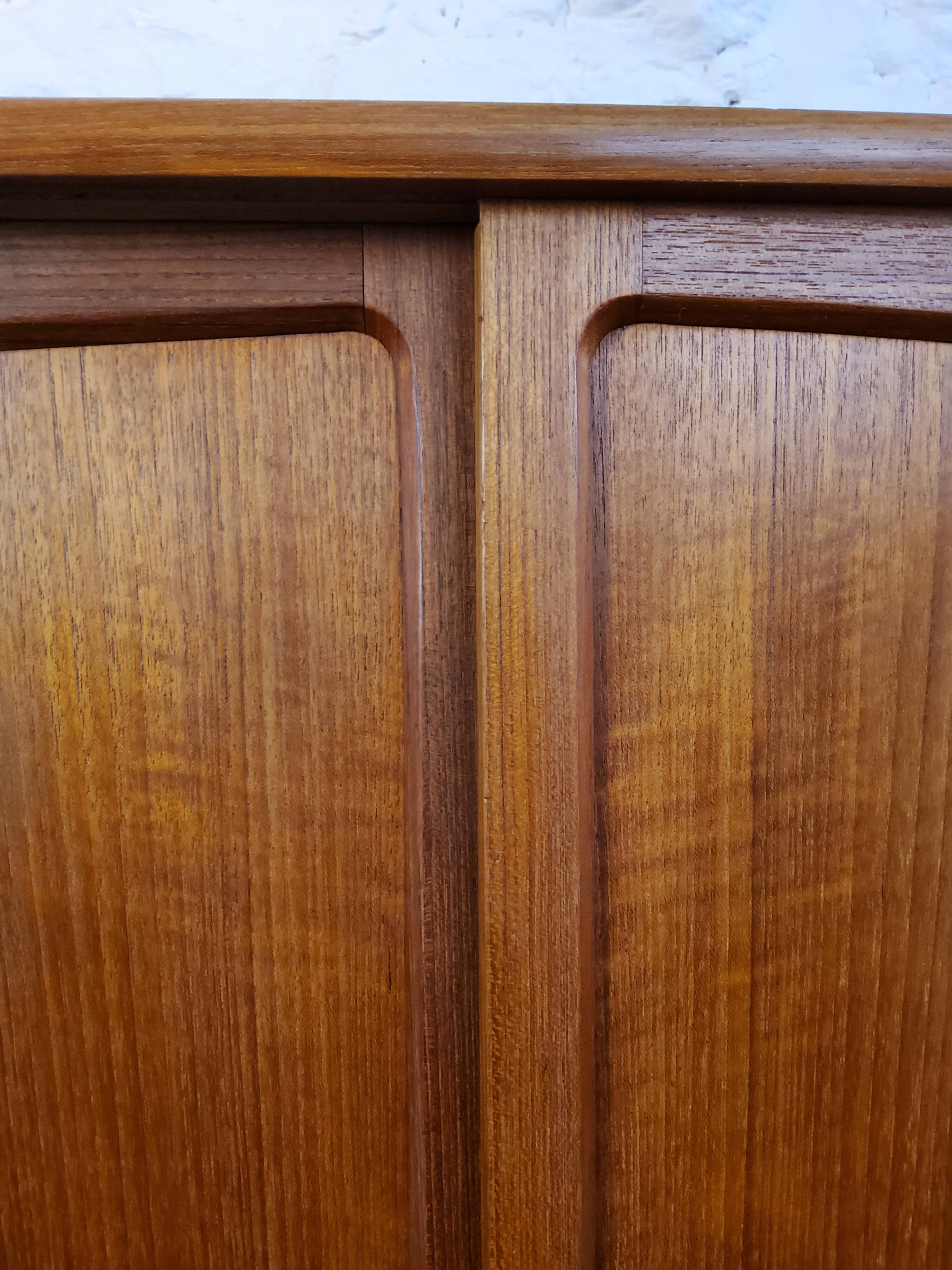 Scandinavian sideboard with sliding doors and drawers - teak