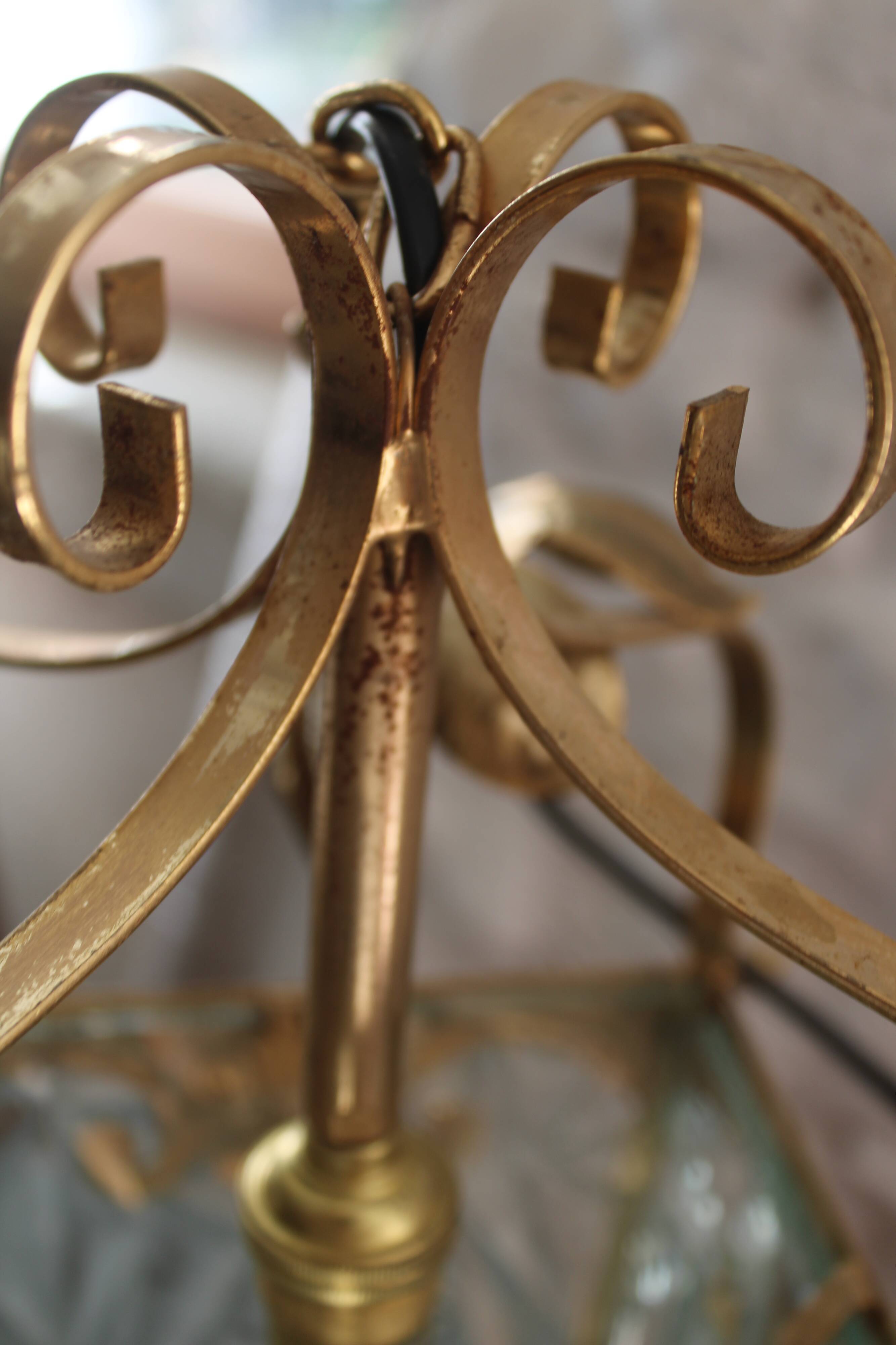 Glass and brass suspension