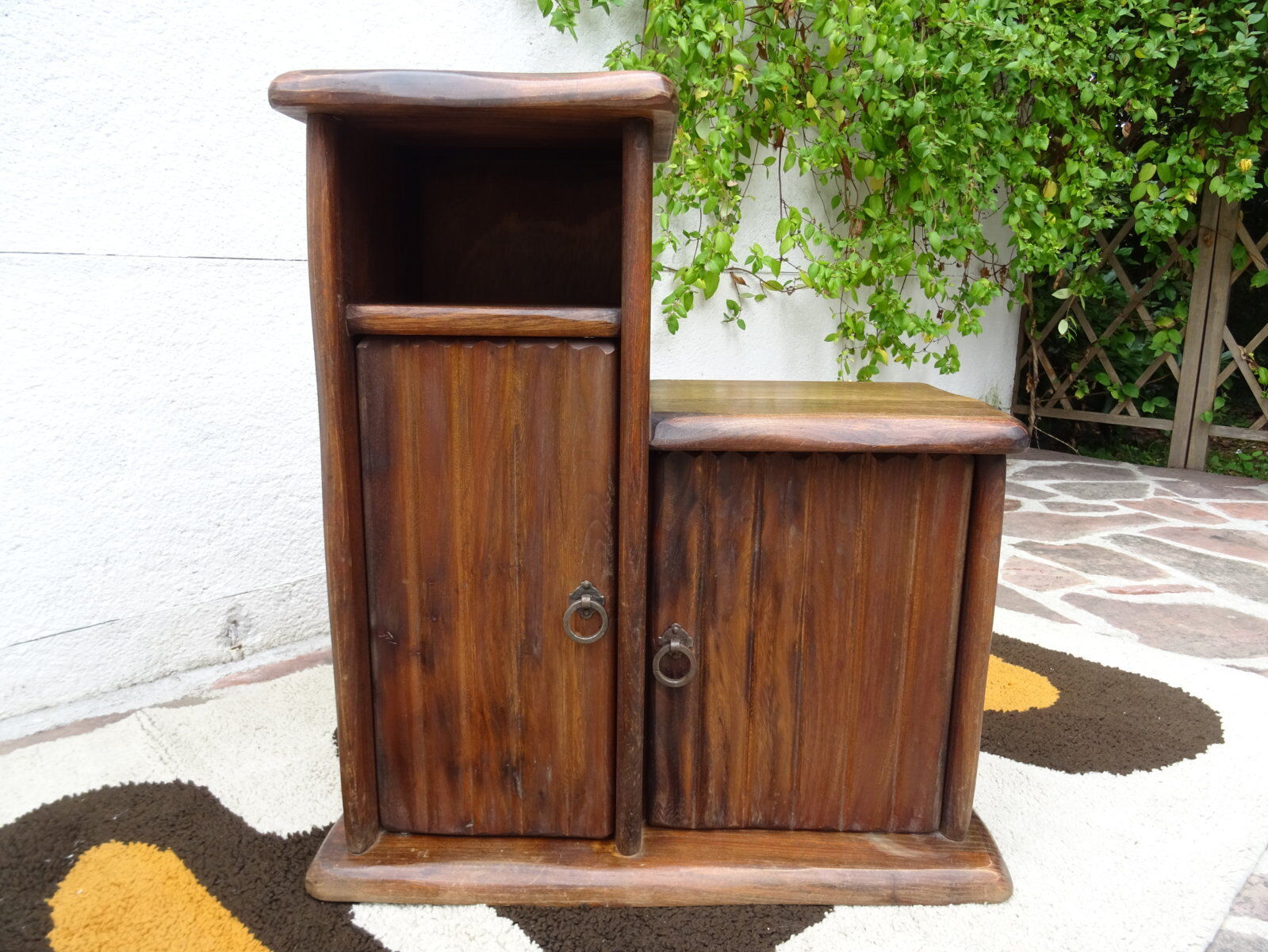 Asymmetrical brutalist furniture in solid elm