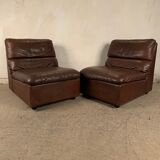 A pair of leather armchairs, Switzerland, 1970s