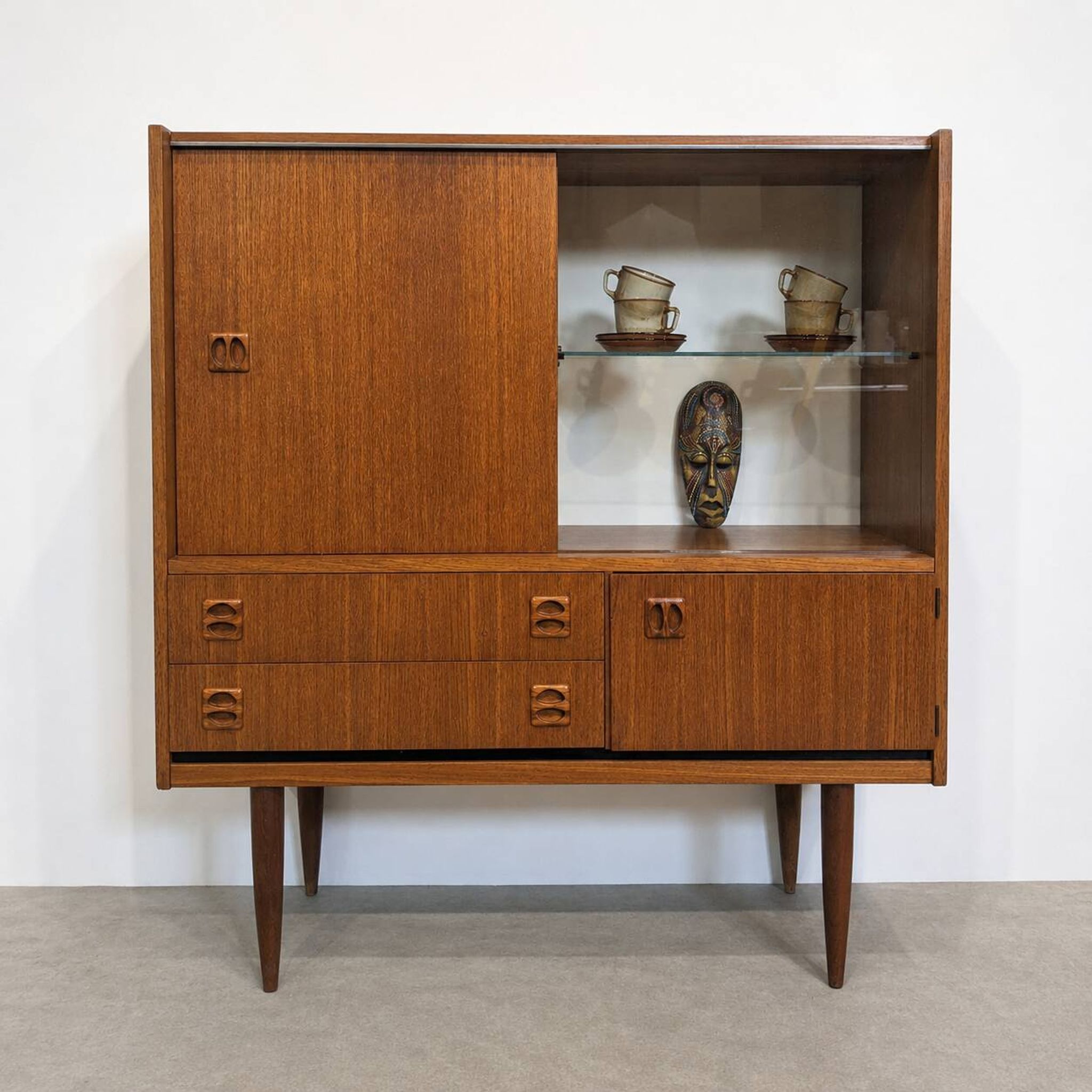 Compact Scandinavian highboard in teak, circa 1960.