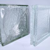 Two designer glass paving pockets