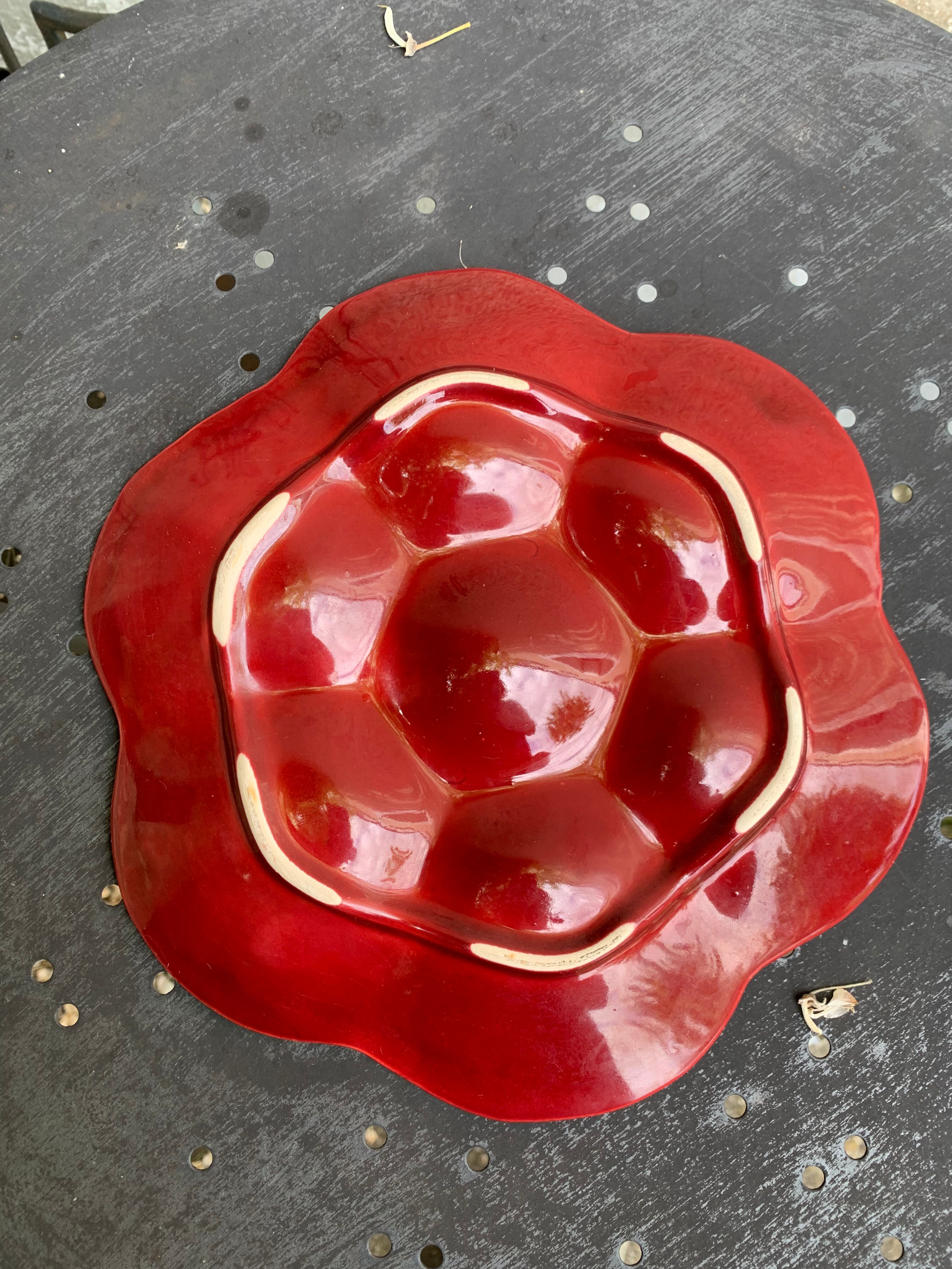4 oyster plates in vintage red glazed ceramic slip and collector