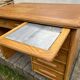 Antique light oak desk from the 1950s with 4 drawers