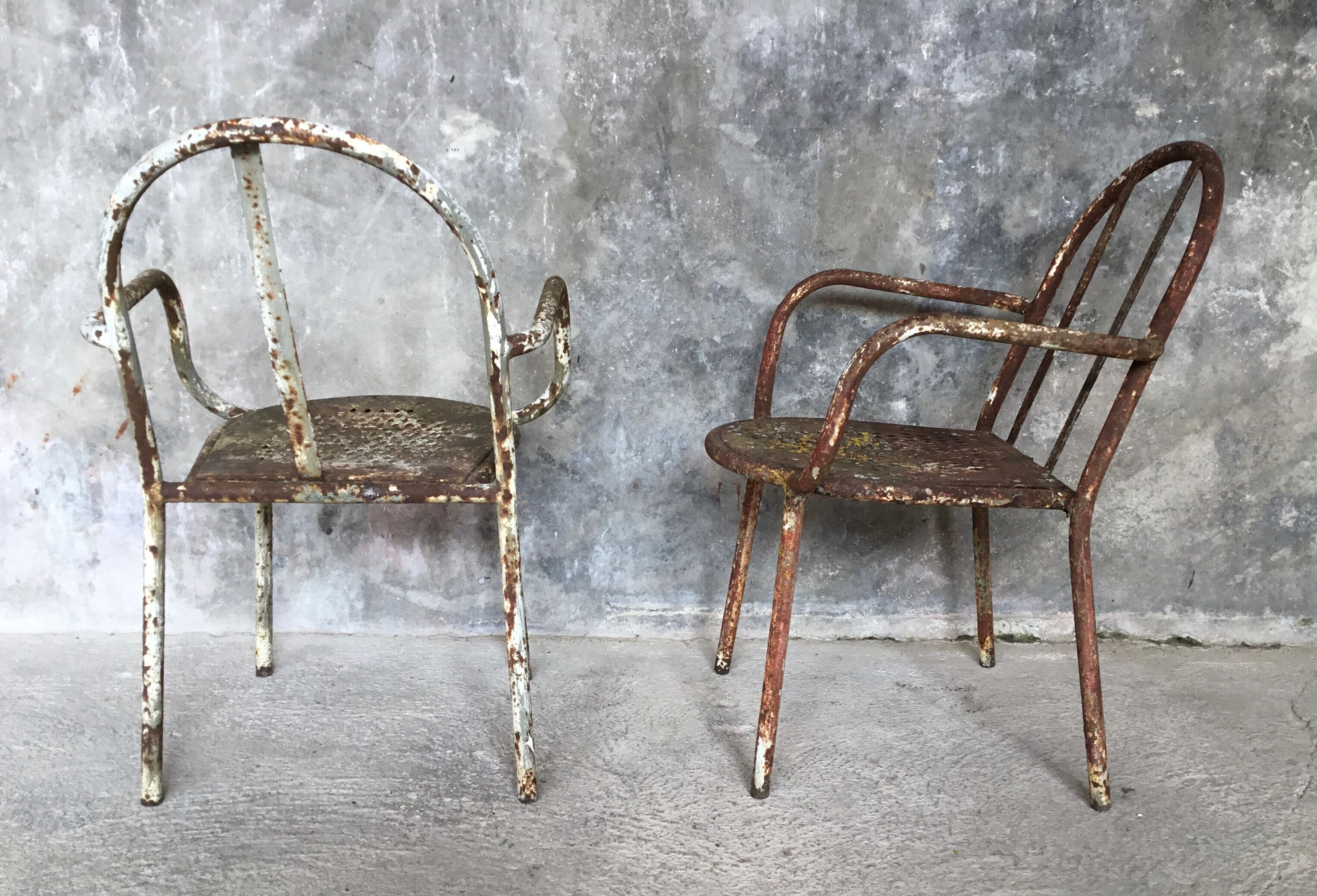 Pair of metal armchairs