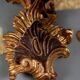 Antique wall sconces in carved lacquered and gilded wood, Italy, 20th century.