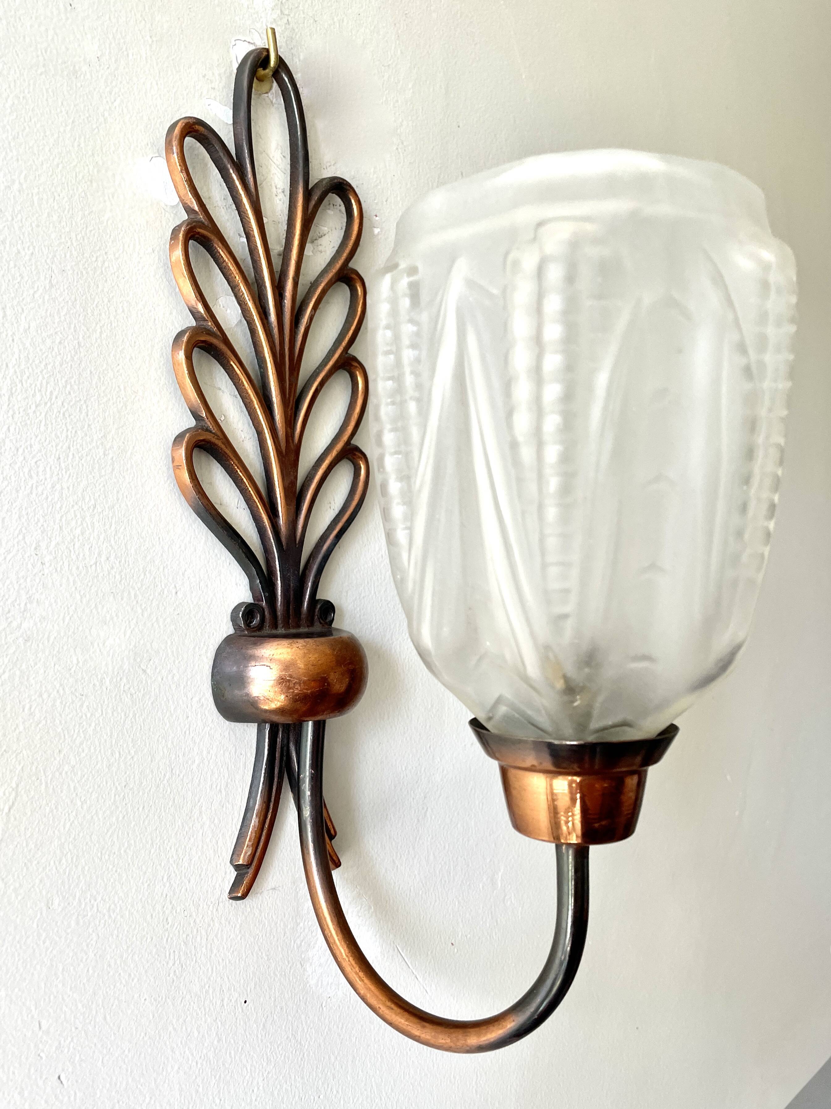Pair of Art Deco wall lights, copper and frosted glass