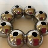 Silver flower vase in a crown shape.