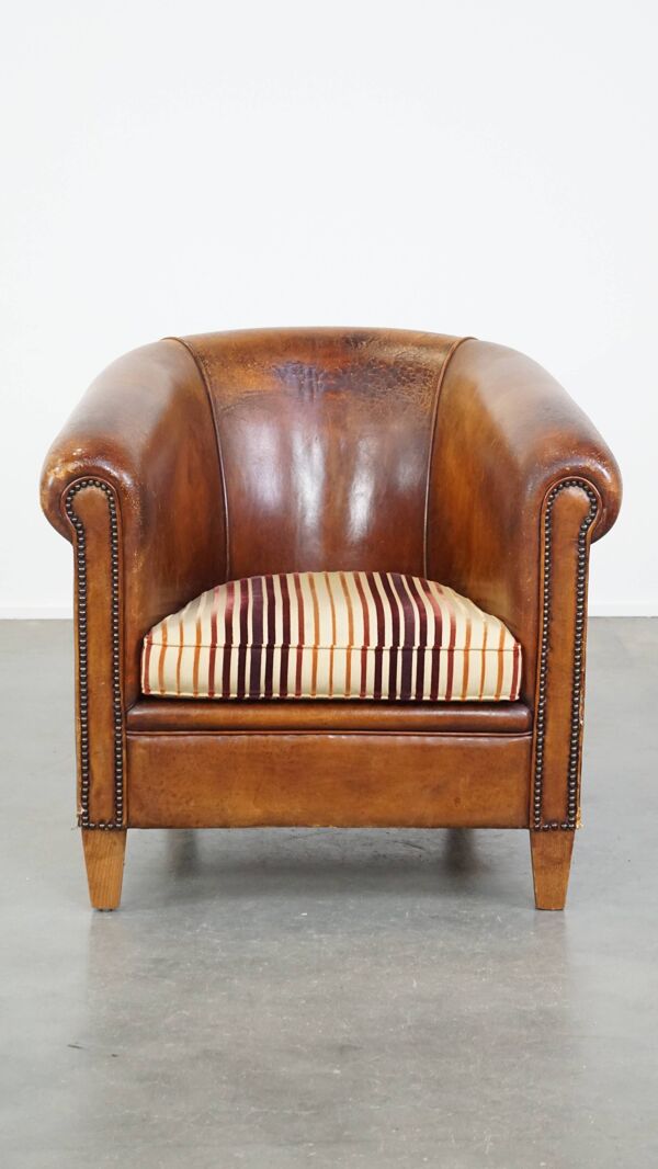 Fauteuil club vintage couleur cognac en cuir de mouton