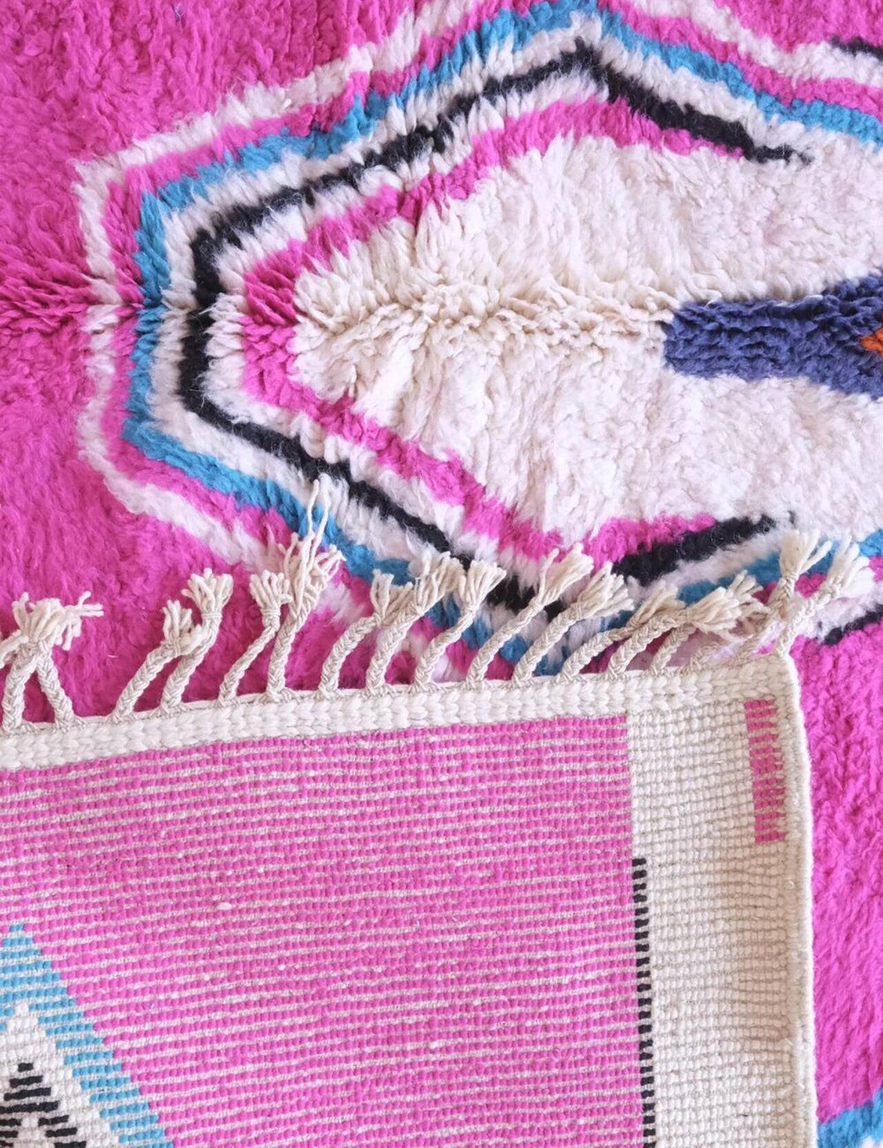 Traditional hand-woven wool Berber rug in pink, size 150 x 250