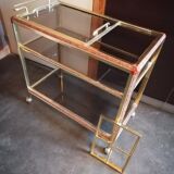 Brass and smoked glass bar trolley with casters