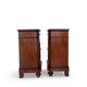 A pair of antique walnut bedside tables from the 1890s.