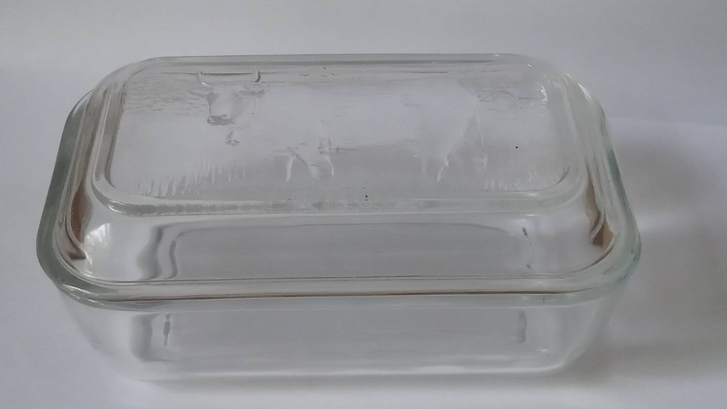 Glass butter dish with cow decor