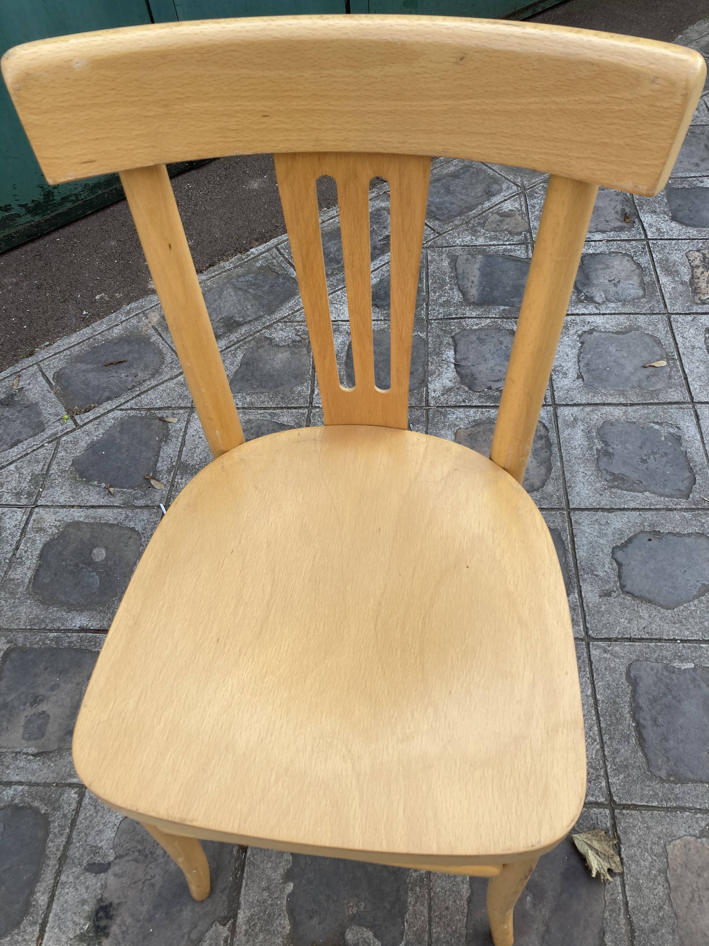 Set of 10 bistro chairs in light beech.