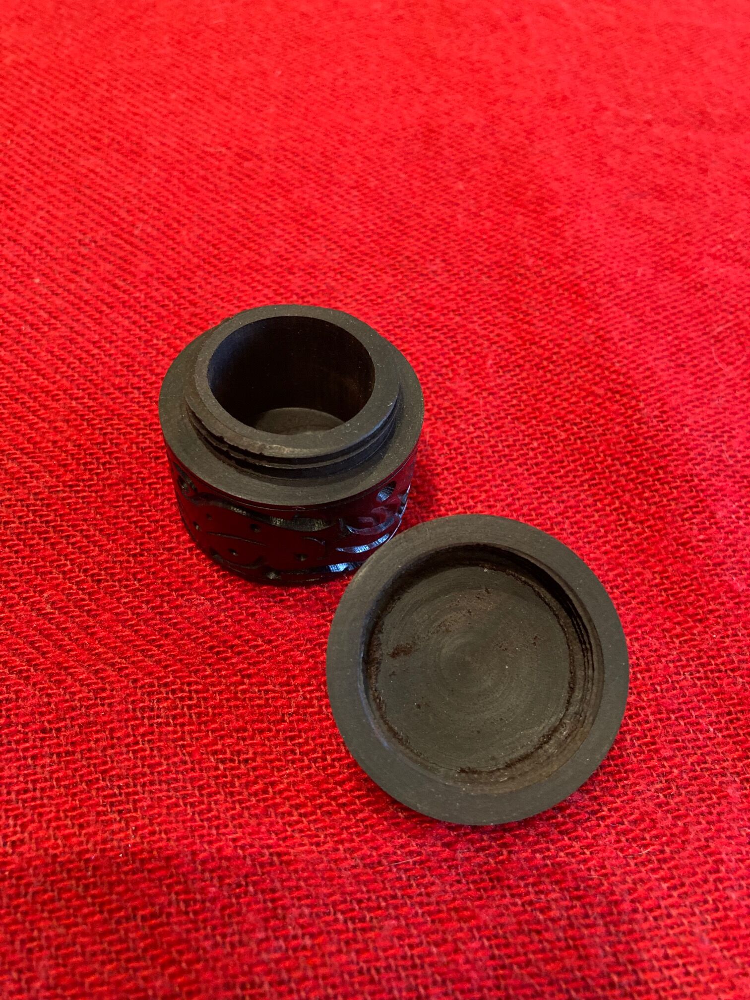 Old round box in carved ebony