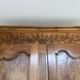 Beautifully decorated walnut wardrobe.