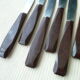 Box of 12 table knives in stainless steel and bakelite EC 144