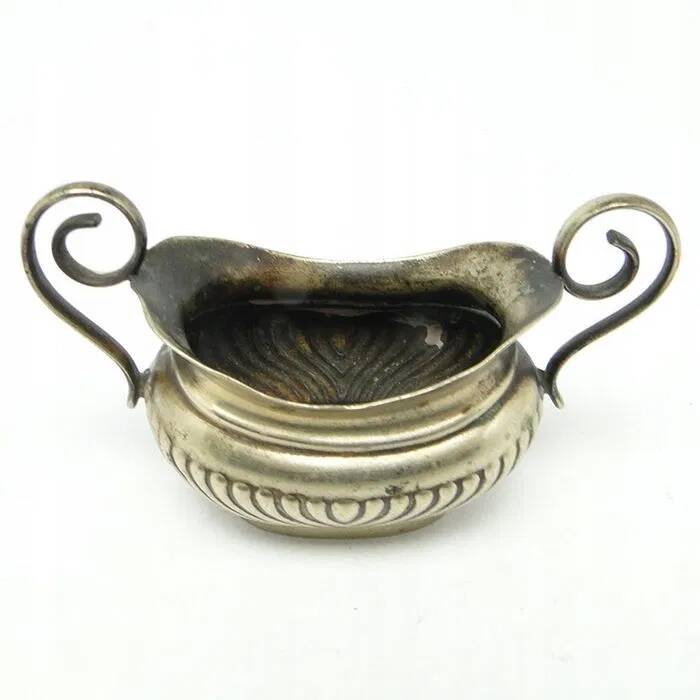 Pre-war decorative salt shaker with ribbed body