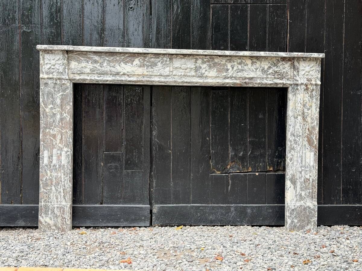 Louis XVI fireplace in grey Ardennes marble, late 18th century.