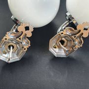 Pair of chrome wall sconces for bathroom with vintage fish pattern.