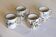 Set of 4 stoneware cups/mugs with blue floral designs, made in China.