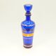 Blue glass decanter with gold decoration