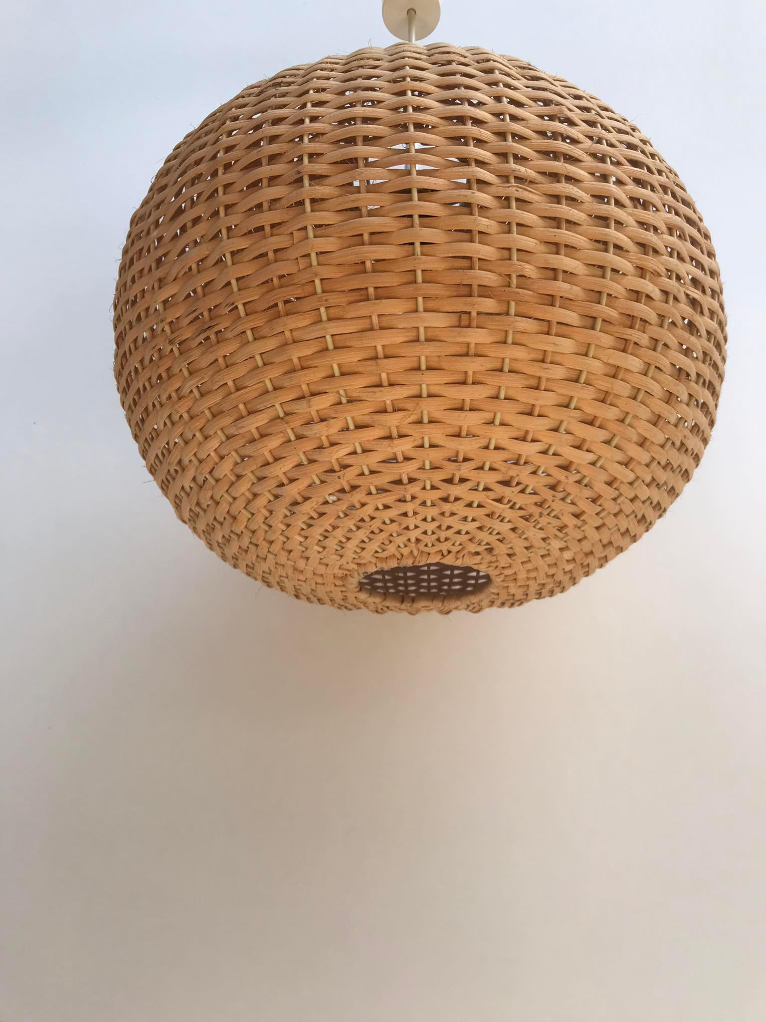 Hanging woven rattan lamp from the 1960s by Jansen Leuchten