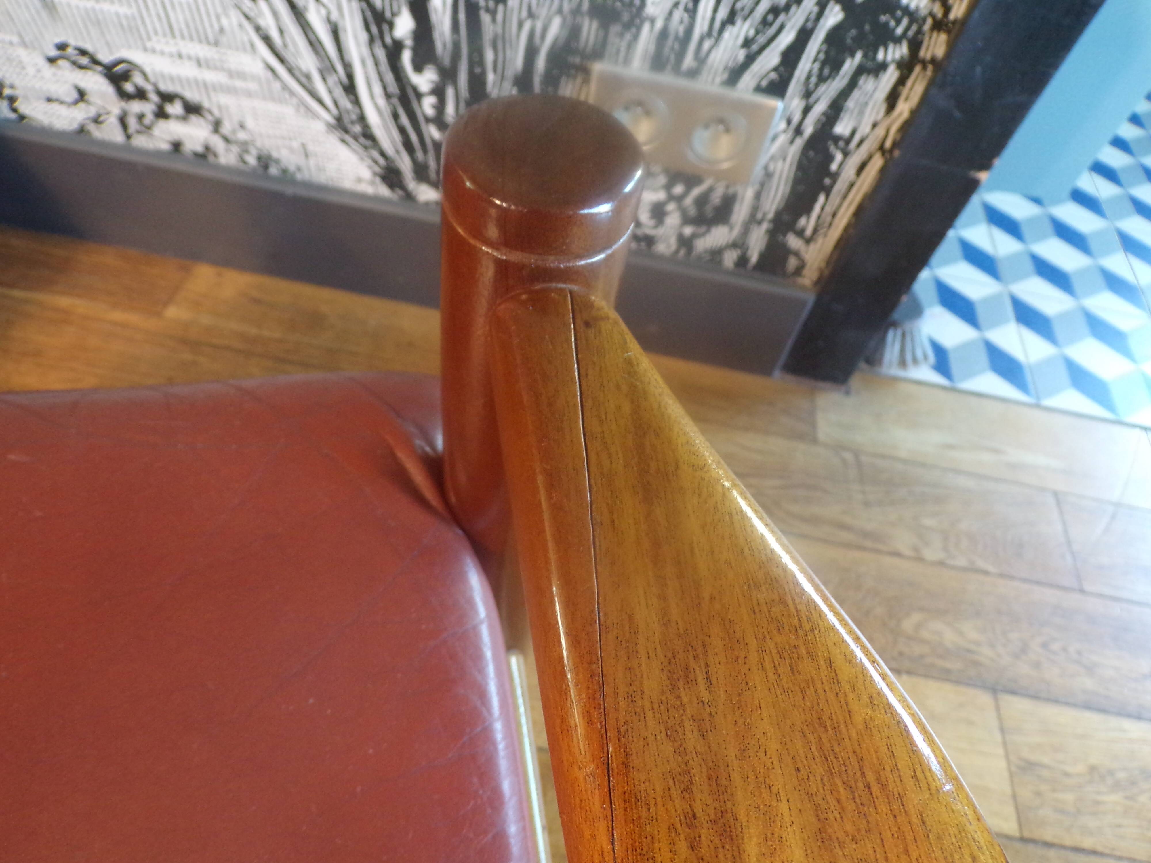 Pair of Scandinavian teak and leather armchairs