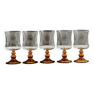 5 small orange colored glass glasses